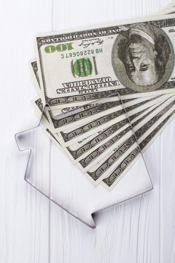 Concept of buying or take a loan house.
