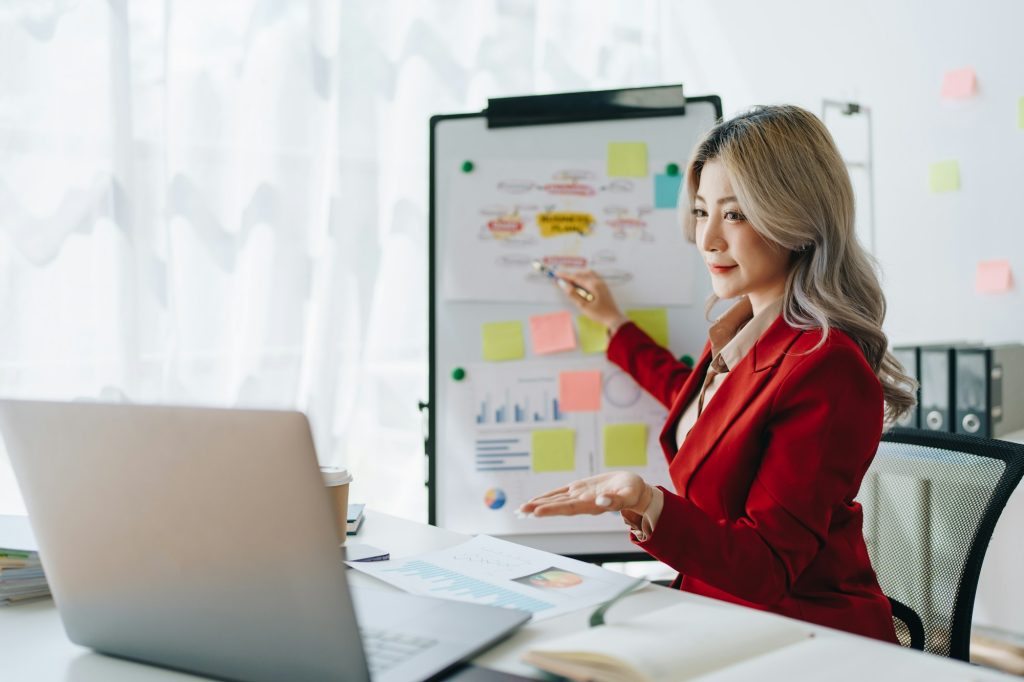 Portrait young business woman presentation marketing profit with confident within investment and sem